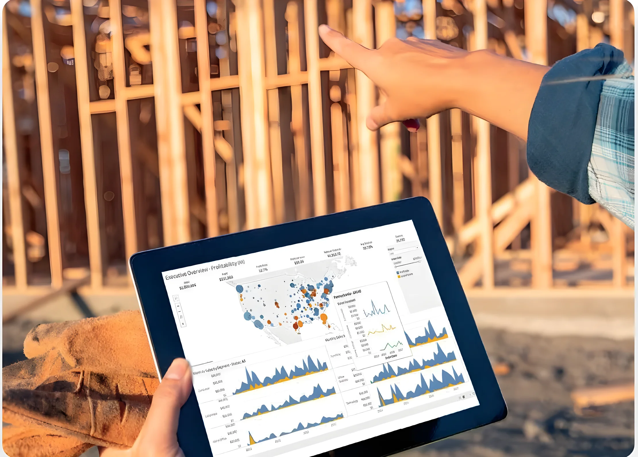 Tablette affichant des graphiques d'analyse de marché, sur un chantier
